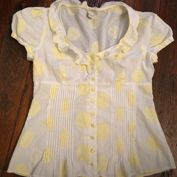 white blouse with yellow flowers